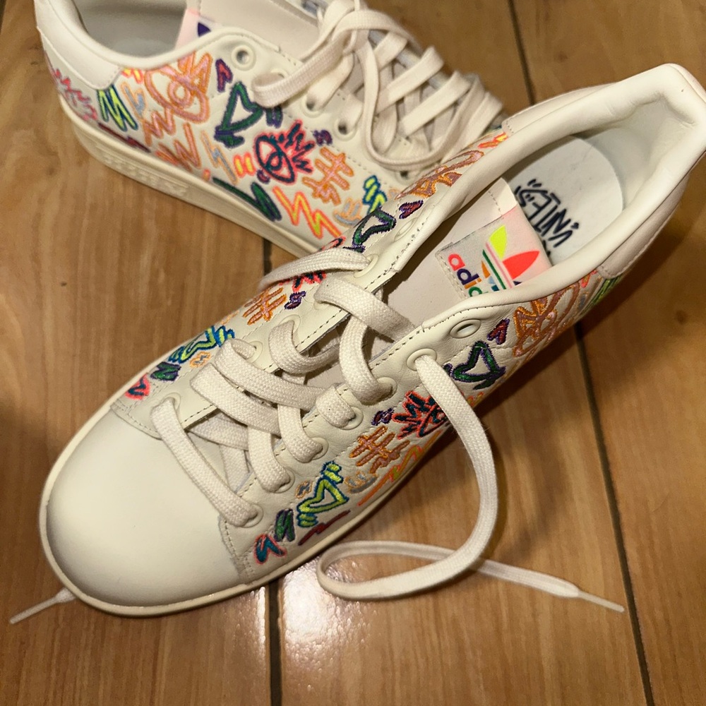 Adidas White and Red Sneakers with Artistic Flair